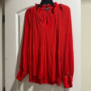 Red pleated blouse